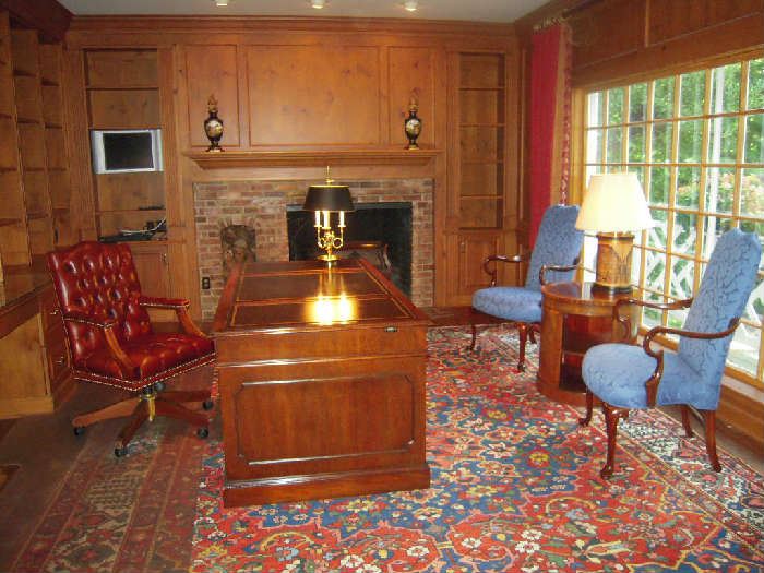Library-First Floor:  Shown is an overview of this very handsome paneled room.