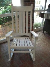 Sun Porch:  One white rocker is made of a composition material.  It's not wood so you don't have to worry about rot or re-painting!
