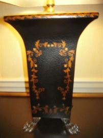 Bedroom #1-Upstairs: The leather-look lamp is black with gold stencil and brass lion paw feet.