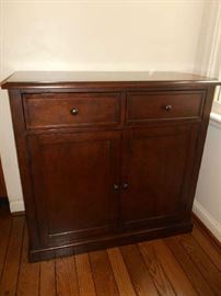 Apartment-Upstairs-Kitchen:  This POTTERY-BARN chest has two upper drawers and two lower doors.  it measures 38" wide x 16" deep x 36" tall.