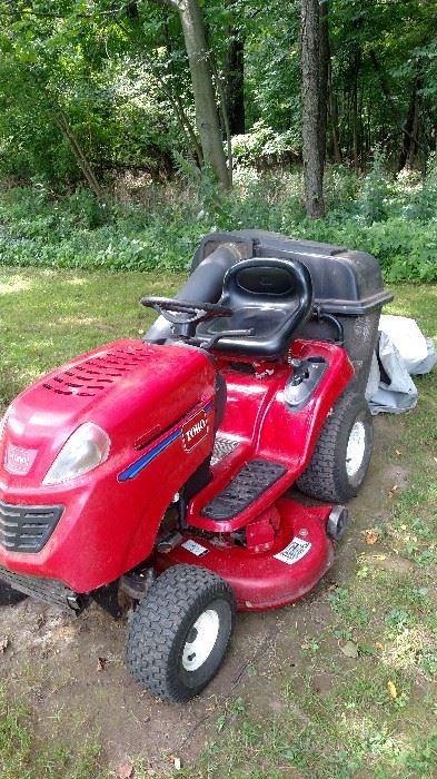 Riding Toro Lawn Mower with bagger.