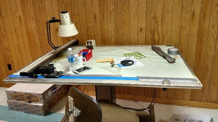 Electric Drafting table that raises tilts.