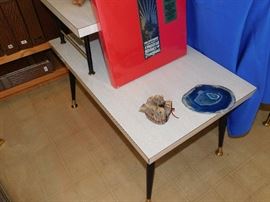 Two tier formica table, which has a second mated table and also a coffee table.