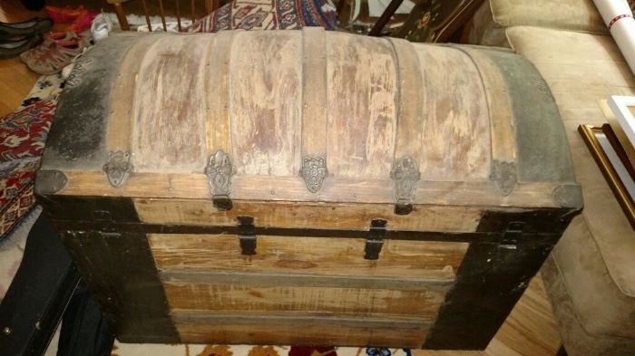Antique dome top steamer trunk with removable tray, cedar lined. Good condition