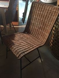 There are 3 of these woven chairs