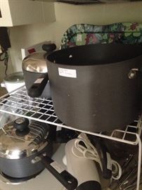 A few of the many pots, pans, and small appliances