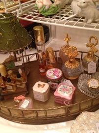 Perfume bottles and hinged boxes
