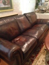 Good-looking three cushion leather sofa