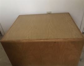 Interesting vintage oak coffee table with hidden storage underneath.