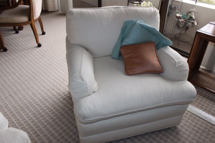 One of two matching armchairs.