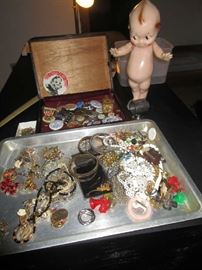 costume jewelry, collector pins, and Kewpie doll