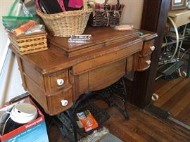 Lovely sewing cabinet. No machine inside, but the cabinet is in excellent condition.