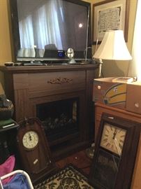 Flat screen TV and electric fire place.