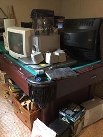 Pool table and other electronic items.