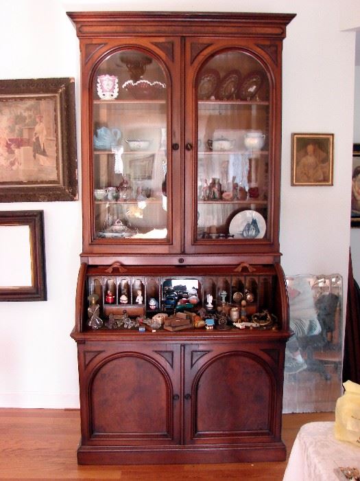 Antique rolltop desk secretary with gingerbread cubbies.  Lots of antique glassware and smalls.