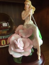 Porcelain figurine with roses 