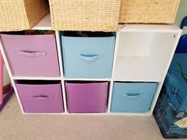 Shelf with storage bins