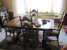 Table, with 6 chairs and 1 leaf