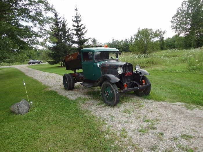 1931 -1-1/2 Ton AA truck with dump box, with rebuilt engine, clutch, king pins, break pads, 12 volt, sealed beams, new tires, turn signals.  Runs great. drive it home. Currently licenced and insured.