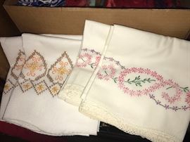 Embroidered pillow cases; there are several sets 