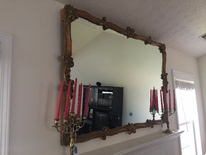 This mirror weighs a ton which is why it's a classic.  Nothing Bed Bath and Beyond about this beauty!  Check out those matching candlesticks!!!