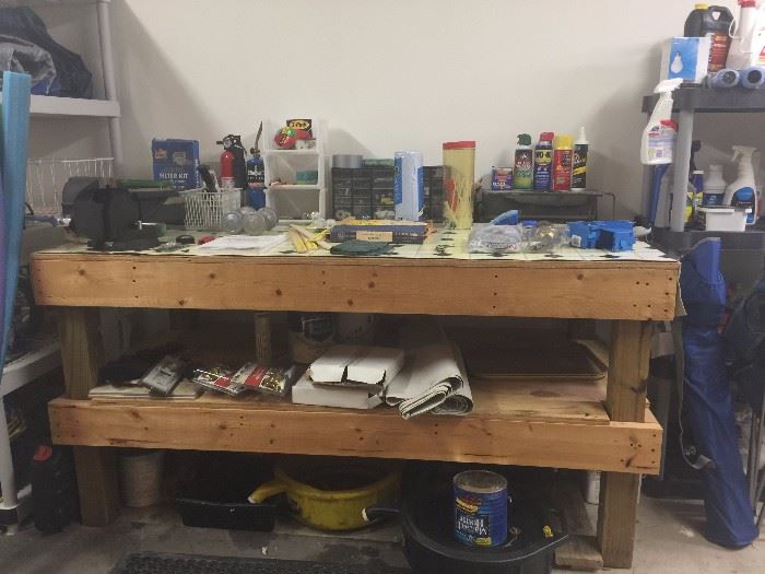 WOW!!! That's a work bench...that's some heavy duty shelves!