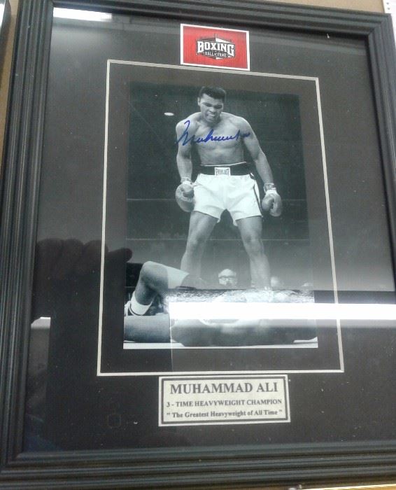 Muhammad  Ali signed photo with a Certificate of Authenticity 