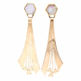 Forney Goldsmiths 14K Yellow Gold Opal Dangle Earrings: A pair of 14K yellow gold and opal dangle earrings. This item was designed and made by Forney Goldsmiths of Bloomington, Indiana. These earrings feature openwork deco inspired dangle that hang from bezel set hexagonal opal cabochons.