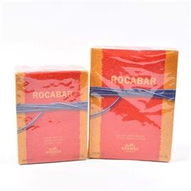 Hermès Rocabar Cologne and After Shave: A pairing of Rocabar cologne and aftershave by Hermès. Included are a 1.60 ounce bottle of eau de toilette spray and a 3.30 bottle of aftershave lotion. Both pieces are presented in their original packaging.