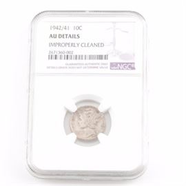 Key Date 1942/41 Silver Mercury Dime: An encapsulated AU Details-Improperly cleaned (By NGC) key date 1942/41 silver Mercury dime. Designer: Adolph Alexander Weinman. Metal content: 90% Silver, 10% Copper. Diameter: 17.9 mm. Weight: approximately 2.5 grams. Circulated. Fair condition. Cleaned.