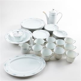 Style House "Corsage" Tableware: A selection of Style House Corsage tableware. This selection includes forty-nine pieces featuring a blue rose and gray vine design with platinum trim. Each piece is marked “Style House Fine China Corsage Made In Japan”.
