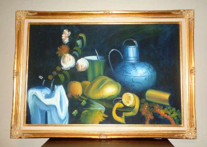 Wonderful still life oil with wooden frame finished in gold.