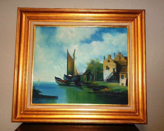 Great oil for the den of a boat lover.  Wooden frame with a gold finish.