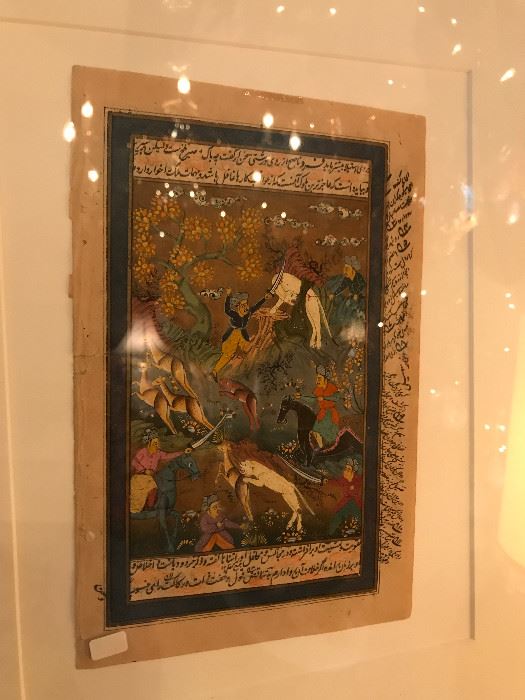 Close of up of one of four of framed illustrated Persian manuscripts 