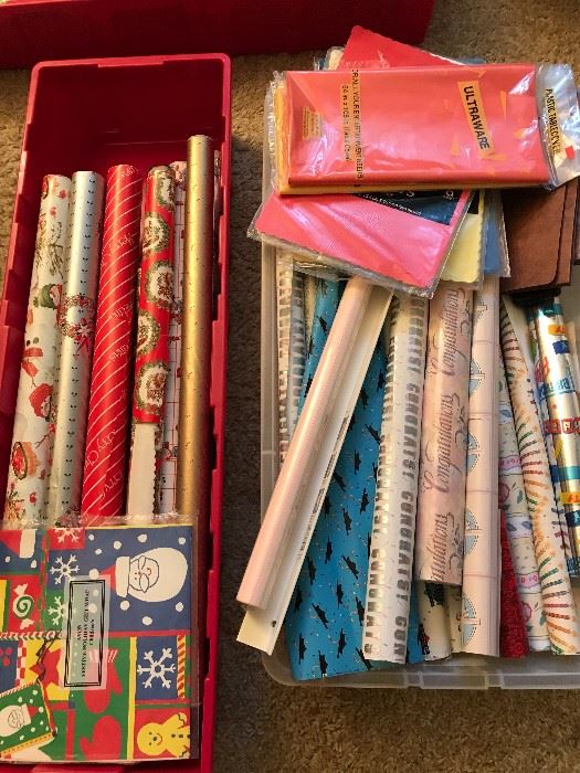 Wrapping paper and gift supplies are still in the house! Come and get them.