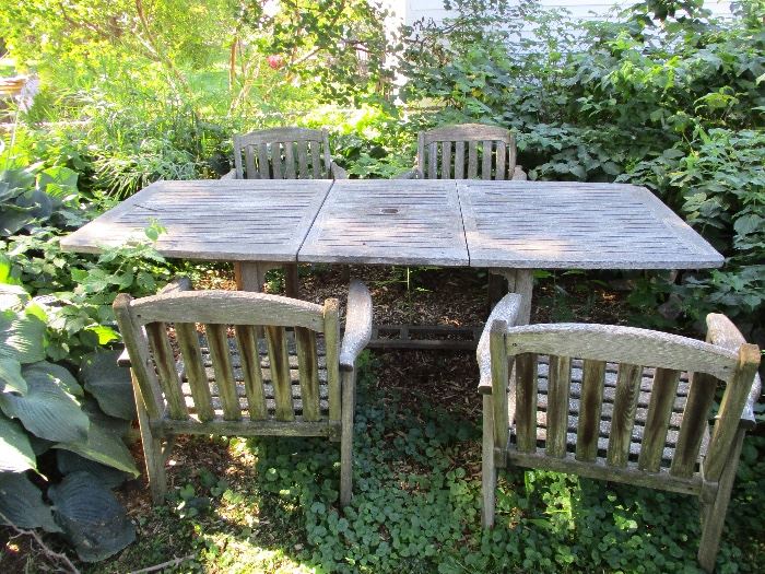 Large wooden table with 4 chairs