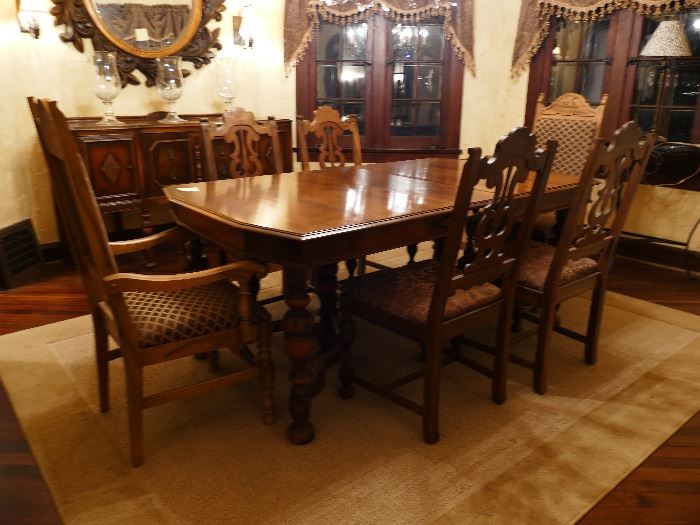 Antique Dining room set with 6 chairs and new cushions