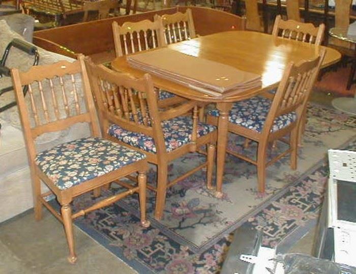 Dining table and six chairs.  $75.00