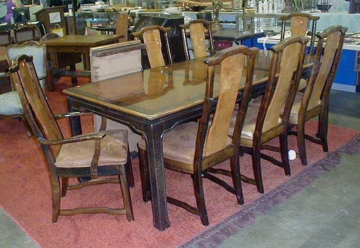 Asian Style Dining table and seven chairs.  $110.00