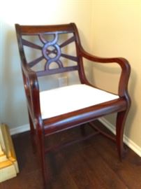 • 6 Dining Chairs from British Khaki of California. 