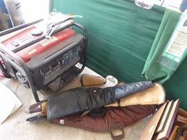 Camp cot, rifle cases, generator
