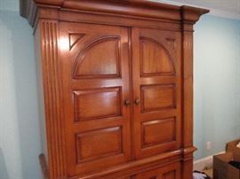 Solid oak entertainment armoire.