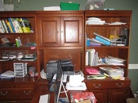 Cherry wall unit with L-shaped desk.