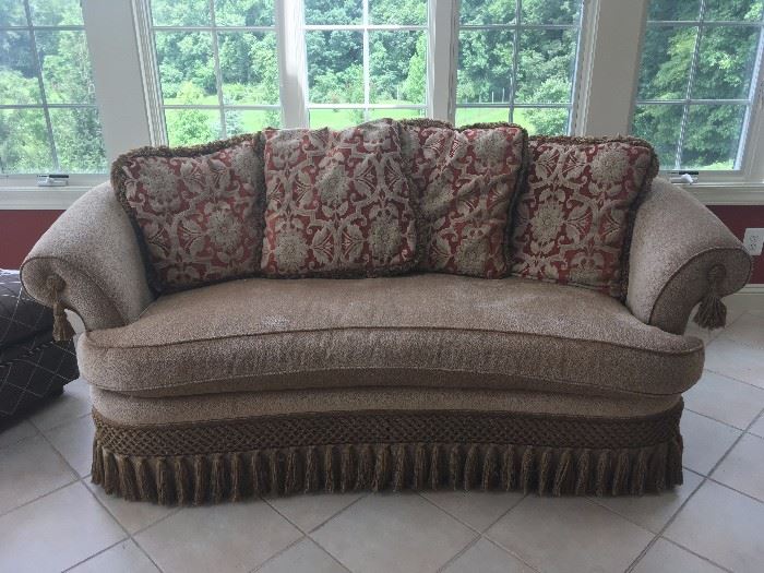 Like new sofa with pillow back by Taylor King.