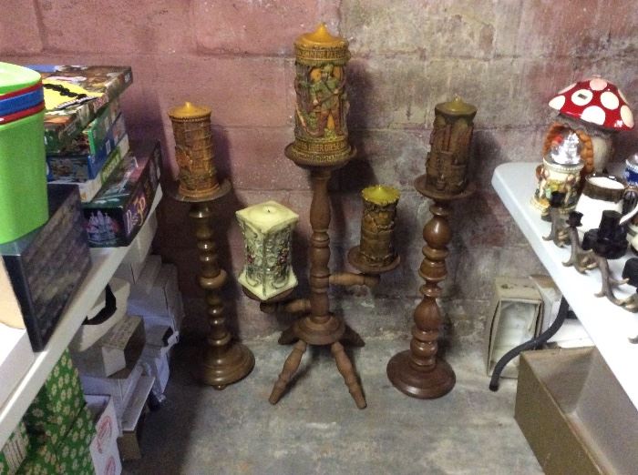 German collectable candles and wooden pillar pedestal candle holders.
