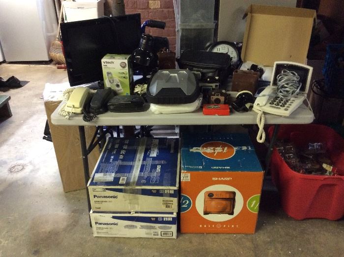 Electronics. Small TV, vors, small microwave oven, vintage camera equipment, and more.