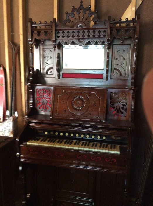 Beautiful antique pump organ.
