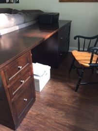 Bassett Gilford cherry desk. 2 drawer and single file on one side and 2 double file drawers on the other 