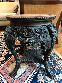 Antique Asian, heavily carved side tables or plant stands