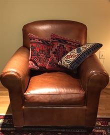 Leather arm chair with vintage Kilim pillows